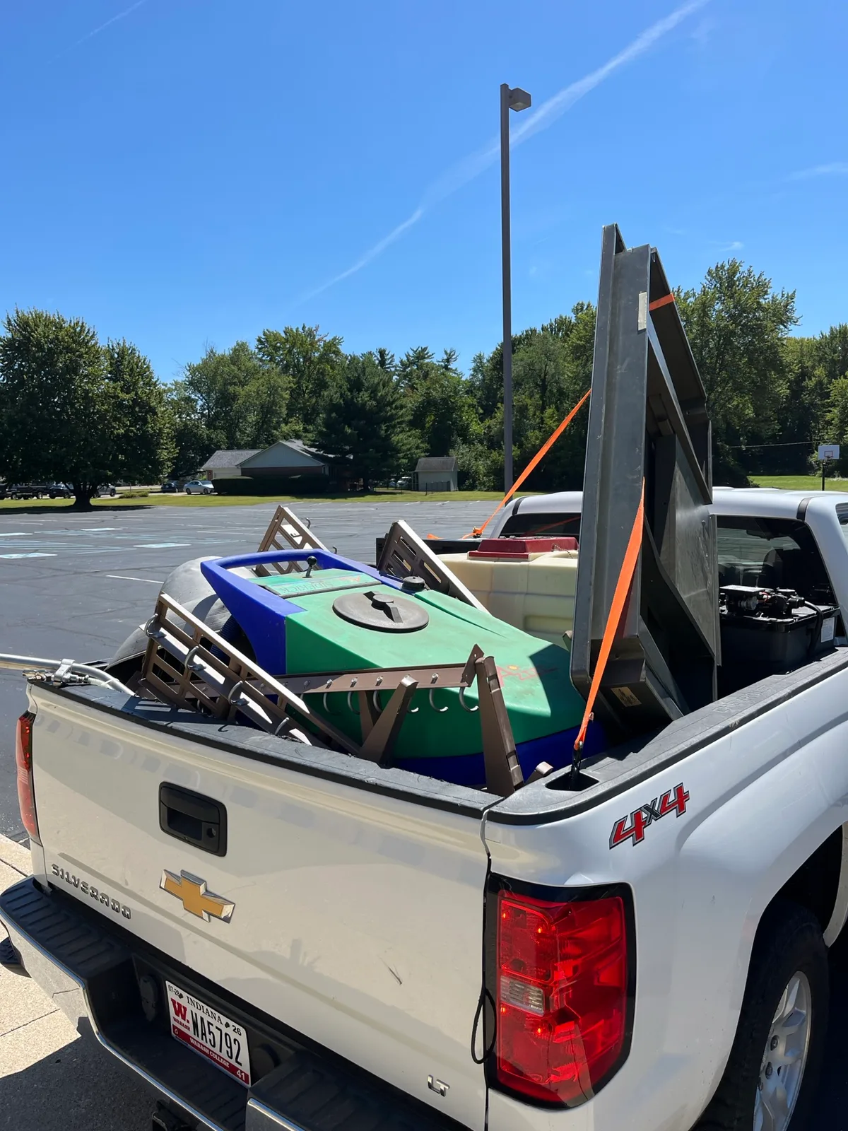 Truck loaded with scrap metal and appliance items collected for $11 per stop in Indianapolis
