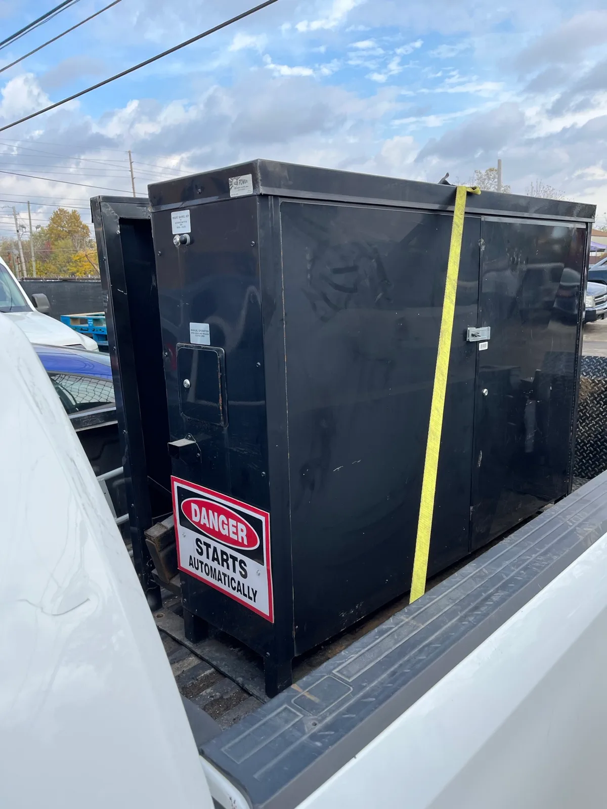 Mixed appliances and metal staged for an Indianapolis pickup
